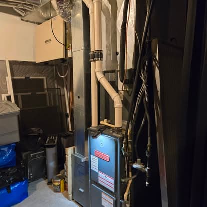 High-efficiency furnace and water heater, utility room